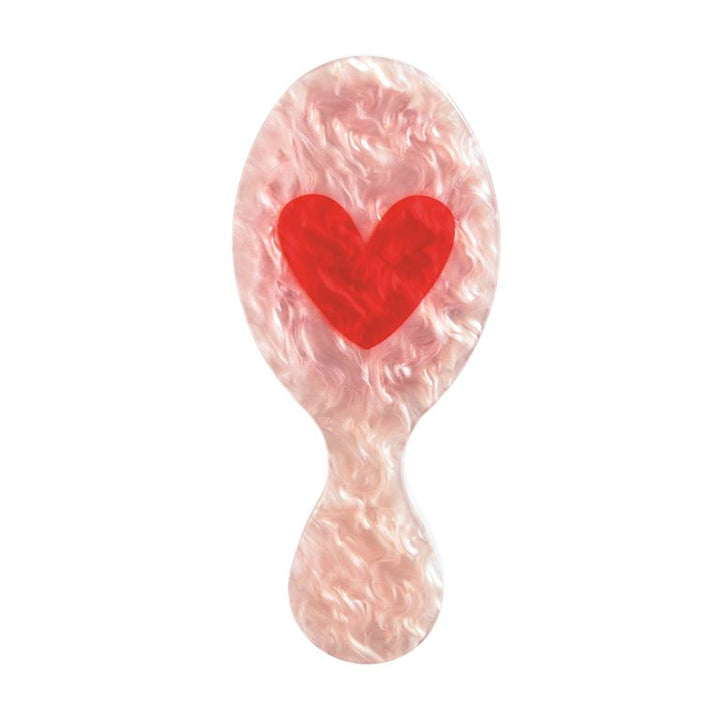 Mud Pie pearly resin mini hairbrushes for girls, available in heart, bow, and multi-bow styles.
