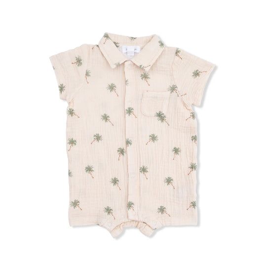 Baby boy organic muslin polo shortie with a green palm tree print on an alabaster background