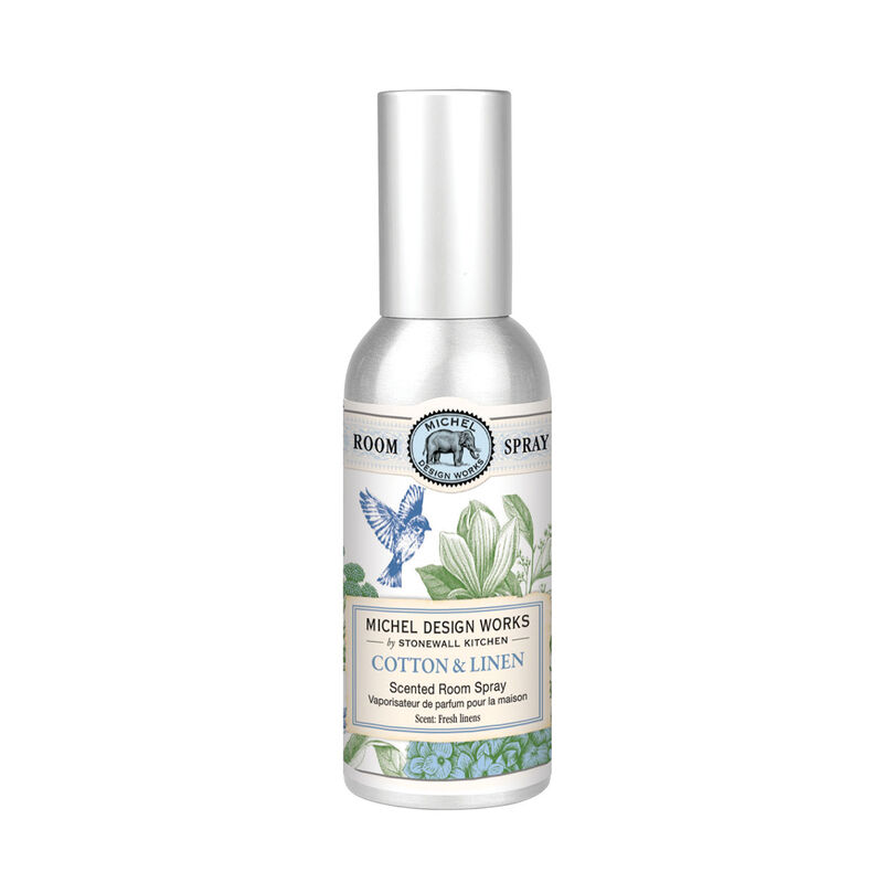 Michel Design Works Cotton & Linen Room Spray in a silver metal bottle with floral and bird artwork.