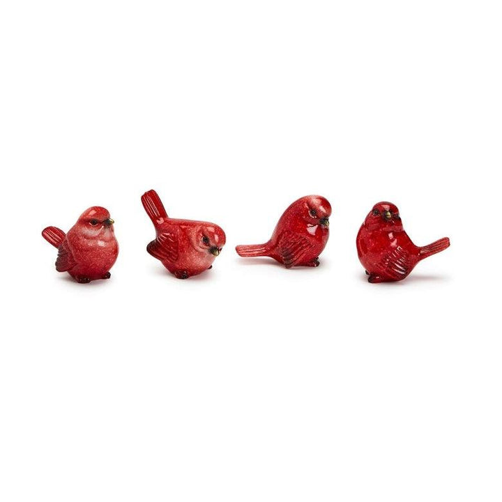 Four red cardinal hand-painted resin bird figurines in different poses.