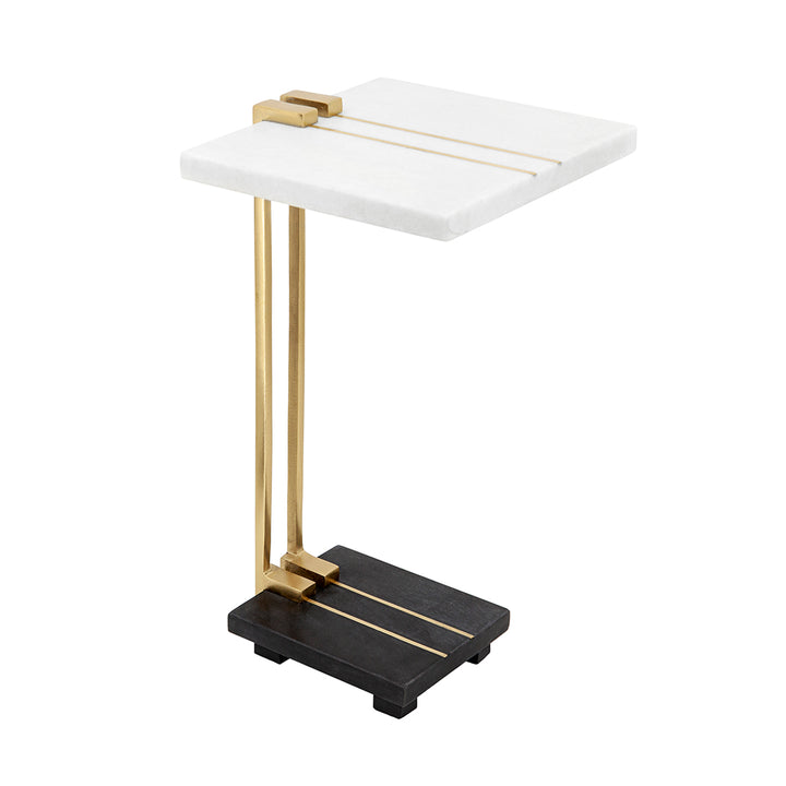 Side table with white marble top, gold legs, and black base on a white background