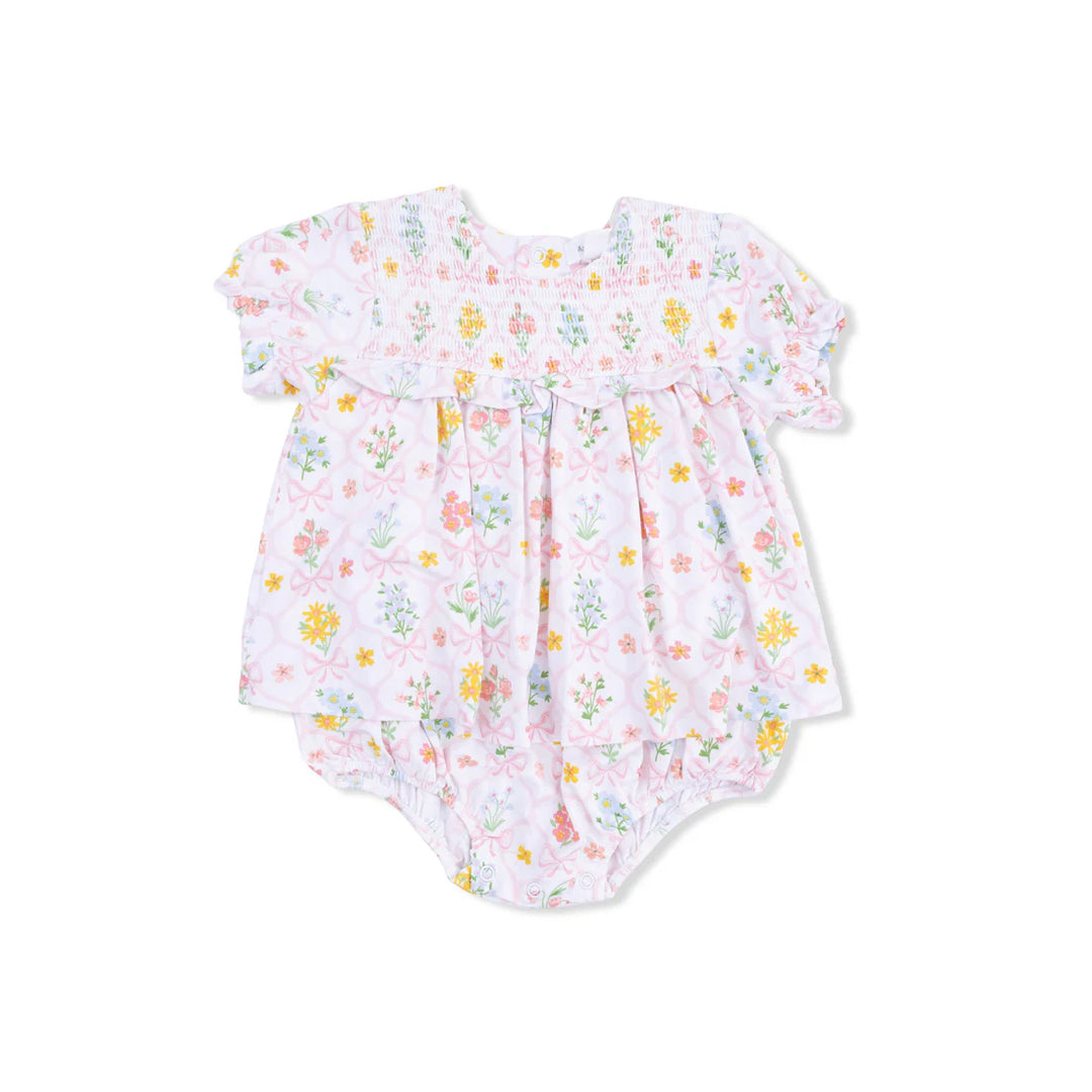 Baby girl bamboo smocked ruffle bubble romper with Spring Blooms bow trellis print and attached skirt