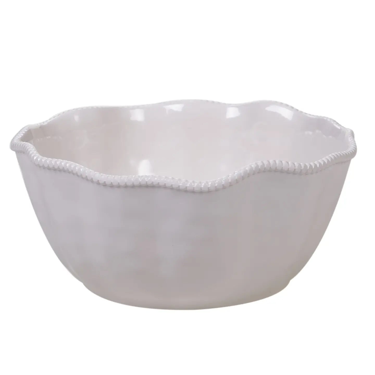 A beautifully set table featuring the Certified International Perlette Cream ceramic deep serving bowl with elegant beaded edges.