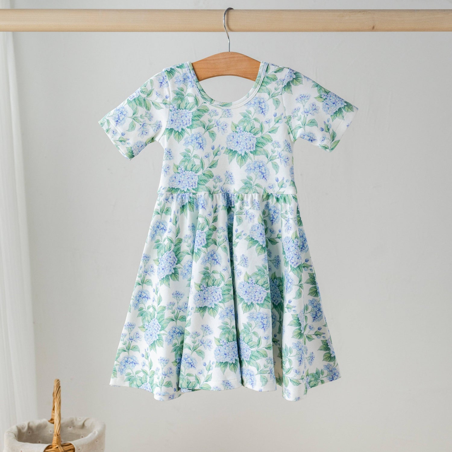 Nola Tawk Hydrangea Heaven girls twirl dress with blue floral print and scooped ballet back.