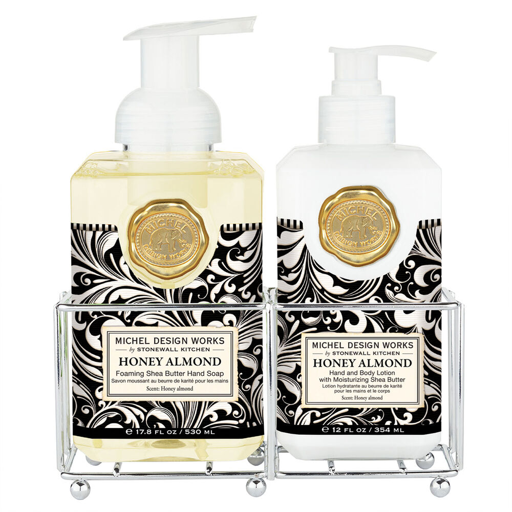 Michel Design Works Honey Almond Hand Care Caddy featuring hand soap and lotion in a black and white swirl design with a silver caddy.