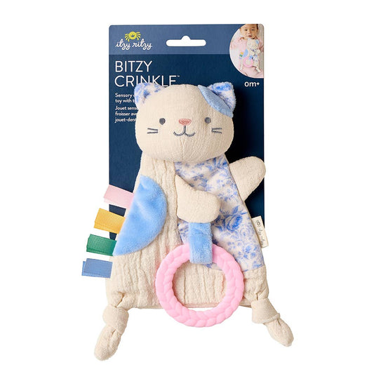 Cat-shaped crinkle toy with pink ring in packaging on a white background