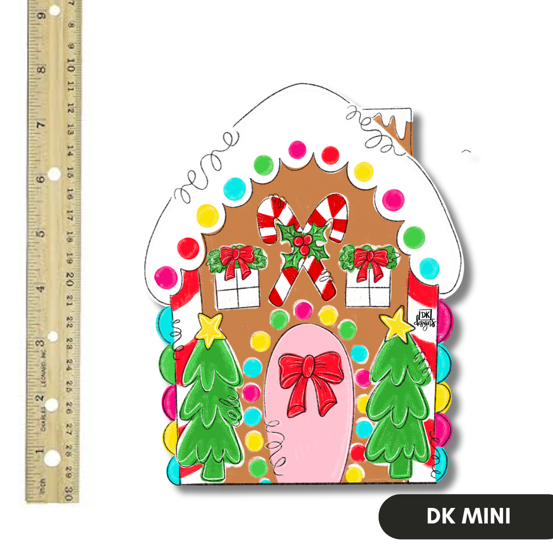 DK Designs Georgia gingerbread house mini door hanger sign with frosted white roof, candy canes, gumdrops, red bows and Christmas trees