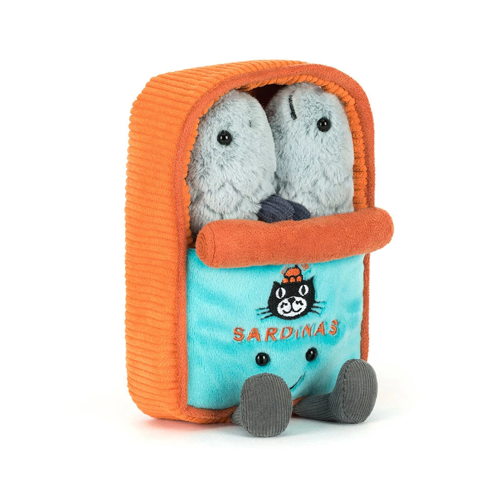 Jellycat Amuseables Sardine Tin plush toy showing its silver-colored soft container and a trio of plush sardines with sweet smiling faces.