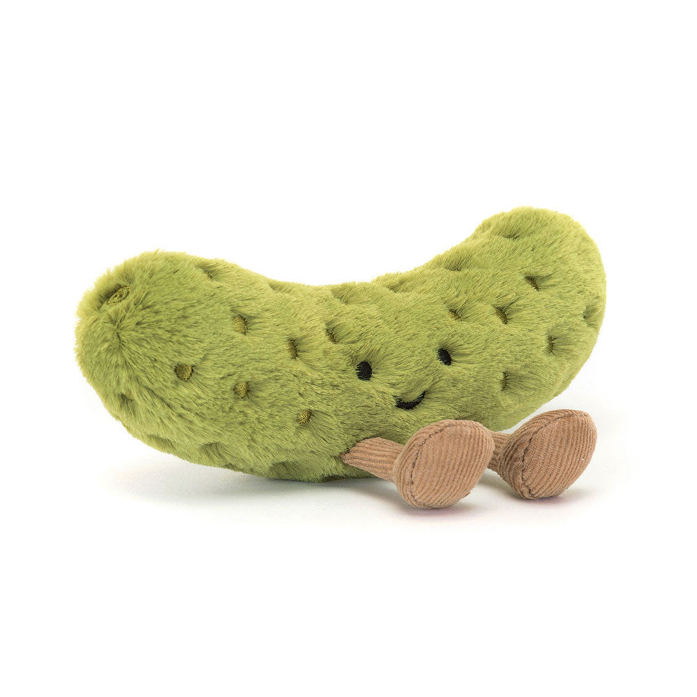 Bright green freckled Jellycat Amuseables Pickle plush with a smile and brown corduroy legs.