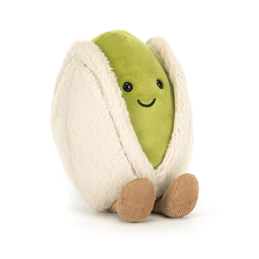 Smiling green Jellycat Horatio Pistachio plush with a beige shell and brown corduroy legs.