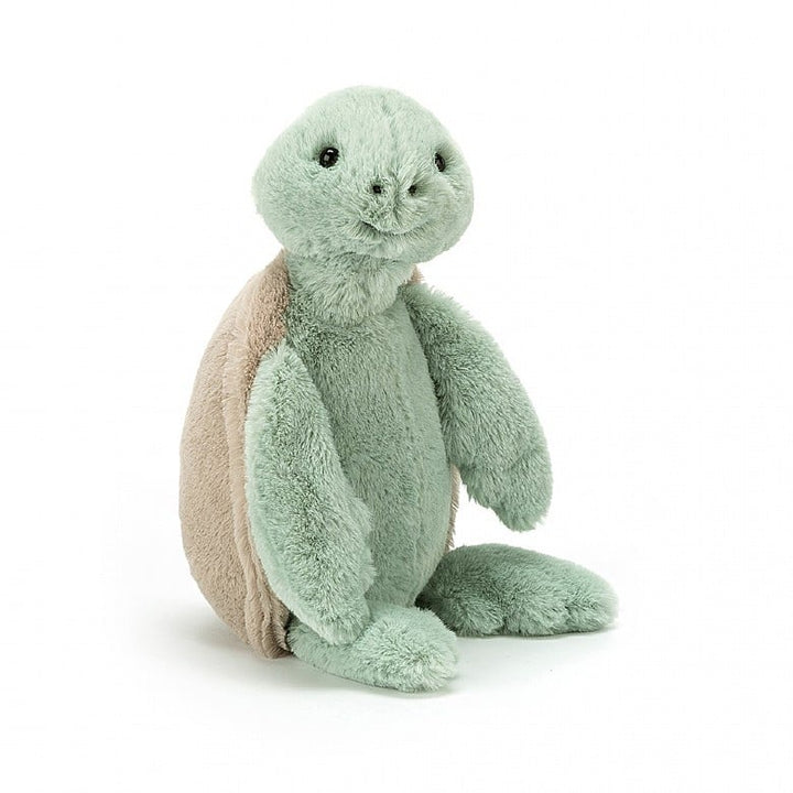 Soft mossy-green Bashful Turtle plush toy by Jellycat with a pale green tummy and flippers.