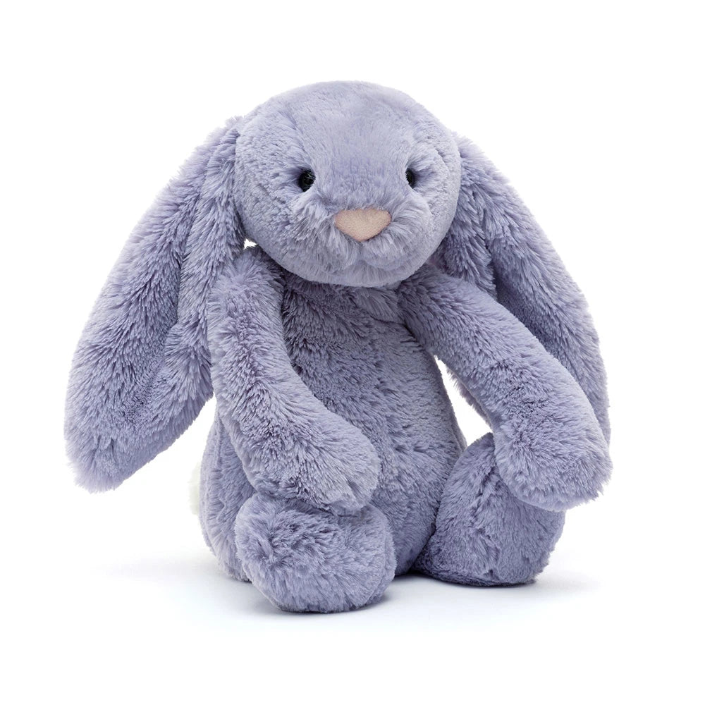 Jellycat Bashful Viola Bunny medium size plush stuffed animal highlighting its unique rich purple fur and long soft ears in a sitting pose.
