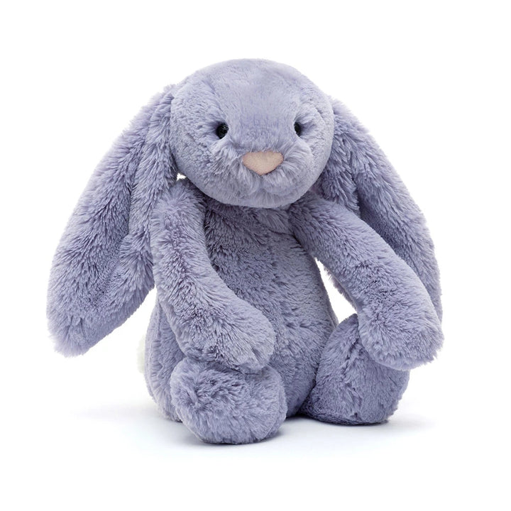 Jellycat Bashful Viola Bunny medium size plush stuffed animal highlighting its unique rich purple fur and long soft ears in a sitting pose.