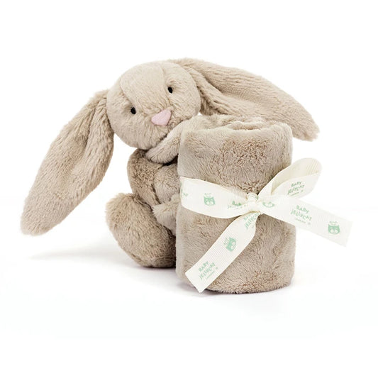 Jellycat Bashful Beige Bunny Soother; a soft cream-colored plush baby blanket with an attached small plush rabbit in the corner.