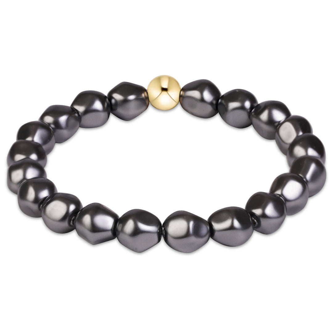 enewton Extends Classic Admire beaded bracelet in dark grey pearl with Classic gold-filled beads, shown stacked on the wrist