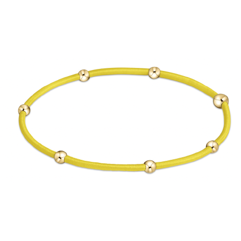 enewton essentials yellow  hair tie bracelet with gold beads