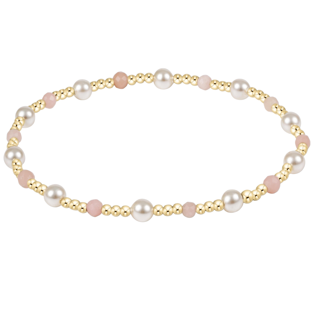 enewton 4mm pearl beaded bracelet with a pink opal gemstone accent in a 7.25 inch extends size; waterproof and tarnish-resistant.