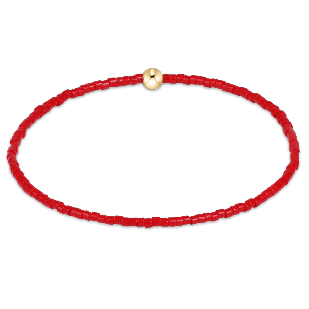 enewton design Hope Classic Bracelet in Bright Red highlighting its hand-beaded design and 14k gold-filled details.