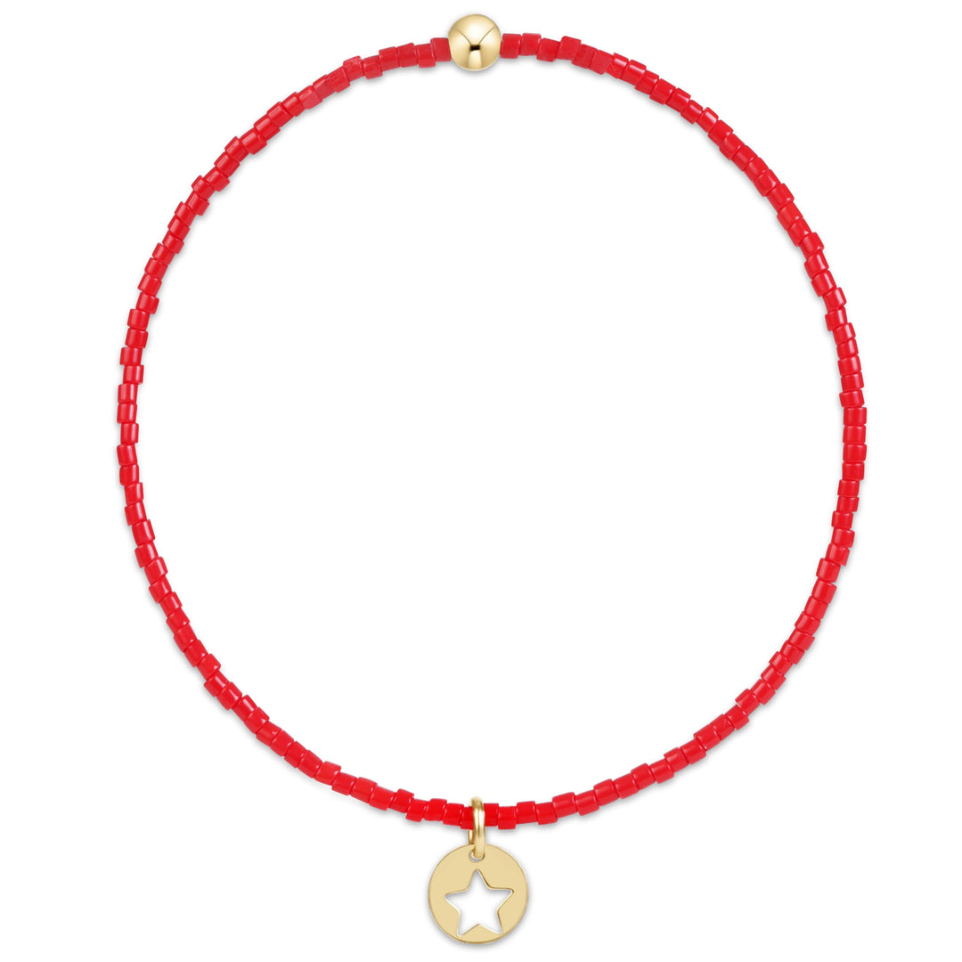 enewton design Hope Classic Bracelet in Bright Red highlighting its hand-beaded design, 14k gold-filled details, and delicate star disc charm.