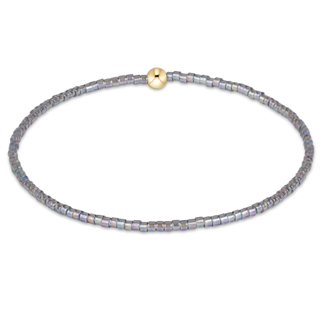 enewton Hope Classic bracelet in Morning Mist blush-pink seed beads with a gold accent bead, shown on the wrist