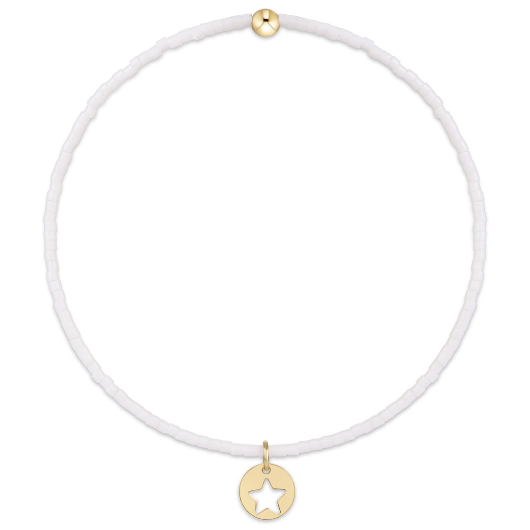 enewton design Hope Classic Bracelet in White highlighting its hand-beaded design, 14k gold-filled details, and delicate star disc charm.