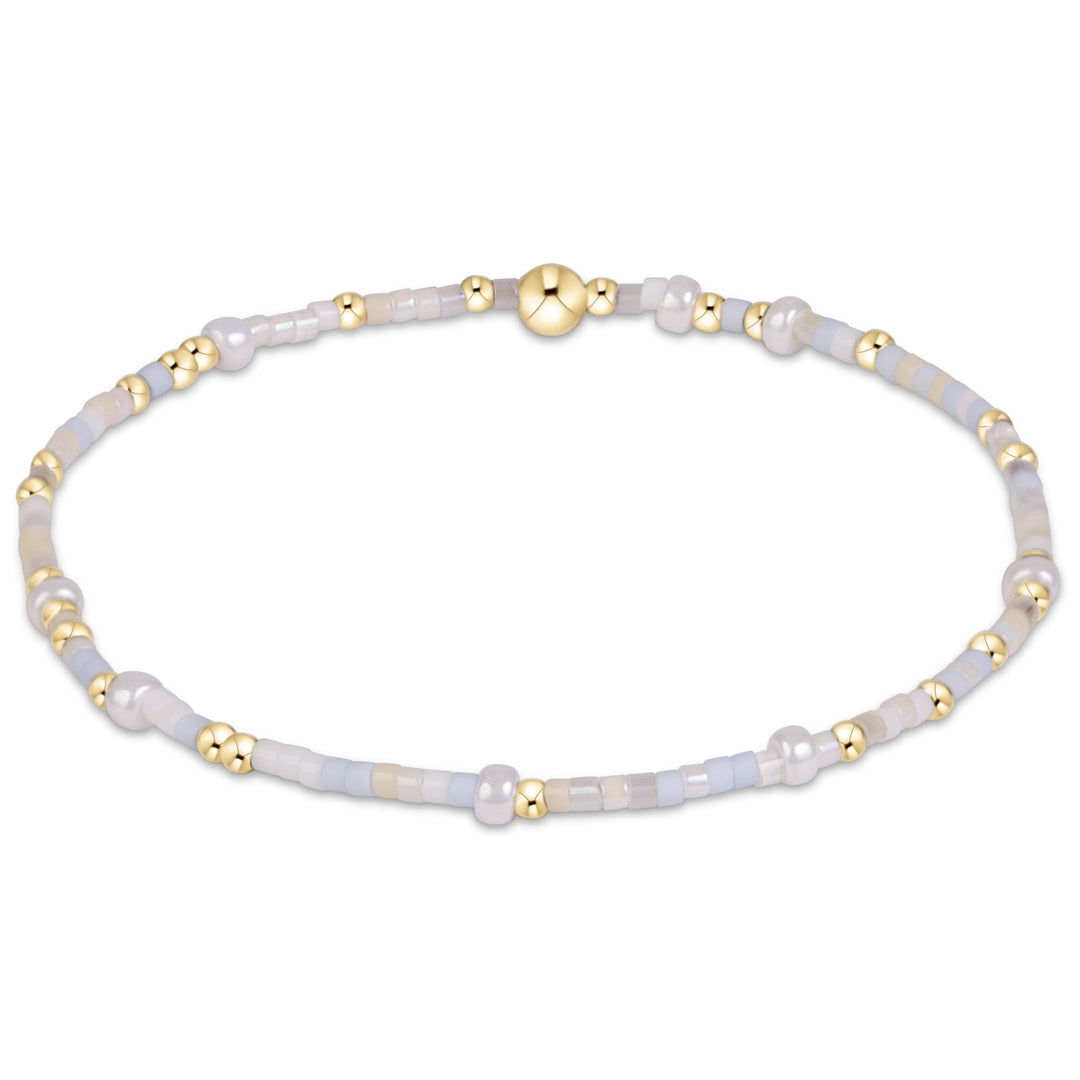 enewton Hope Unwritten bracelet in Daydreaming, a soft pastel mix of beads, shown stacked on the wrist