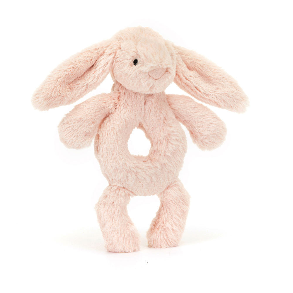 Pink plush bunny toy on a white background