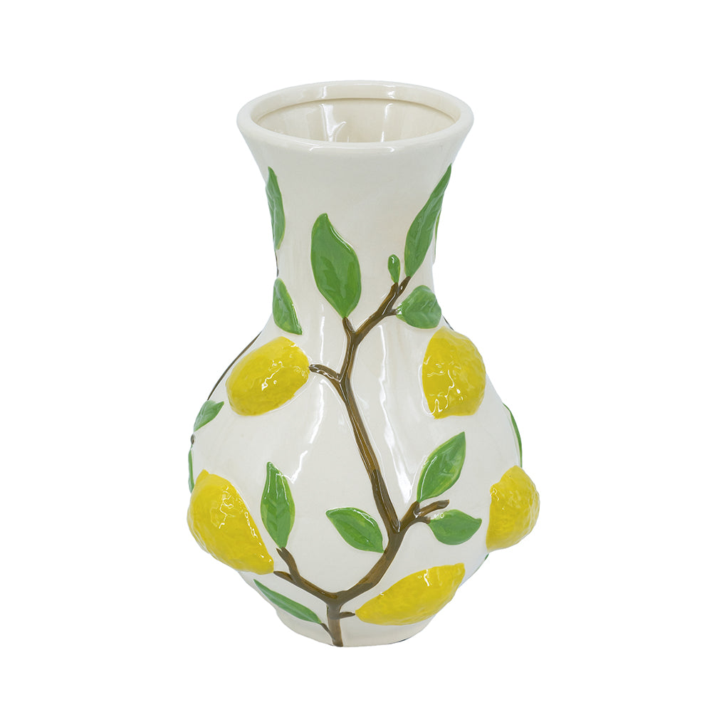 Ceramic vase with lemon and leaf design on a white background