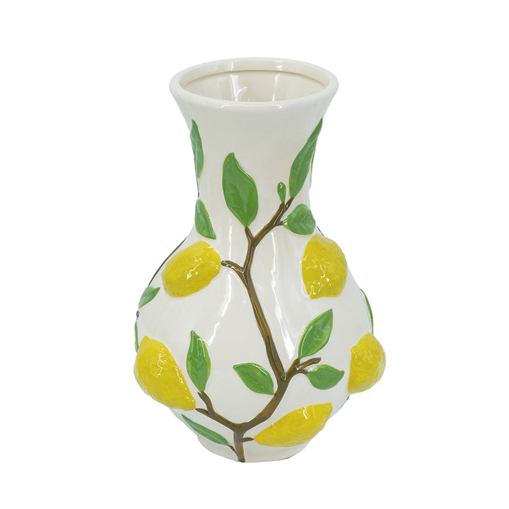 Ceramic vase with lemon and leaf design on a white background
