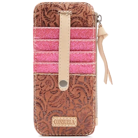 Consuela Sally Card Organizer featuring a brown tooled leather exterior, hot pink glitter detailing, and a natural leather strap closure.