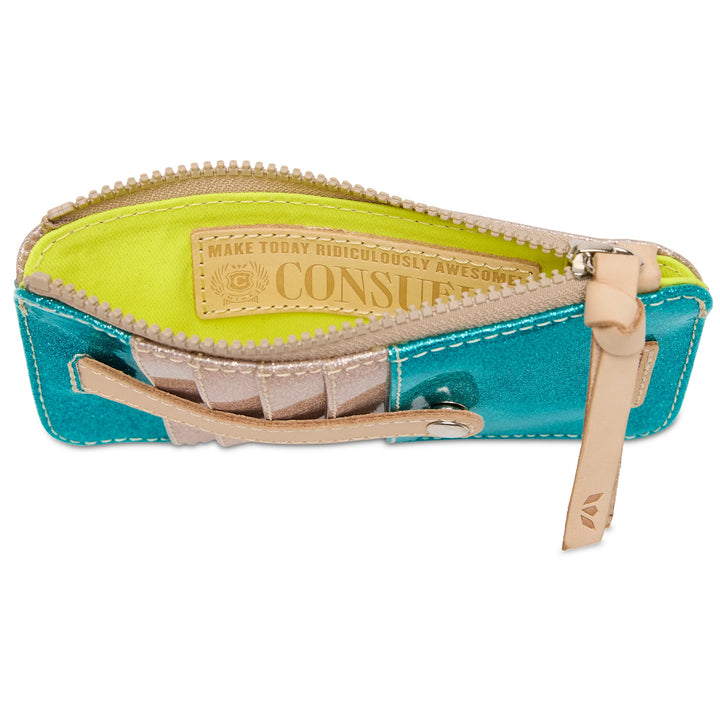 Inside view of the Consuela Lumi Card Organizer showing card slots, ID pocket, and snap closure.