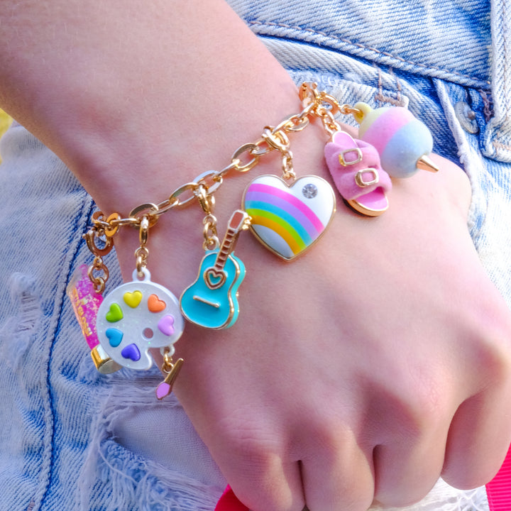 Charm It Gold Furry Pink Sandal charm styled on a girls charm bracelet