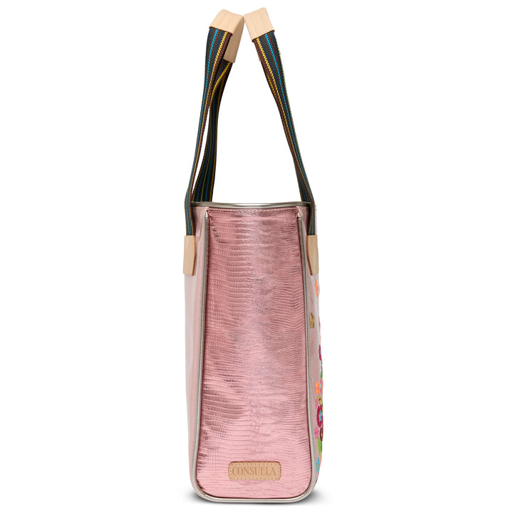 Side profile of the Rosaline Classic Tote highlighting the pink metallic panels and woven handles.