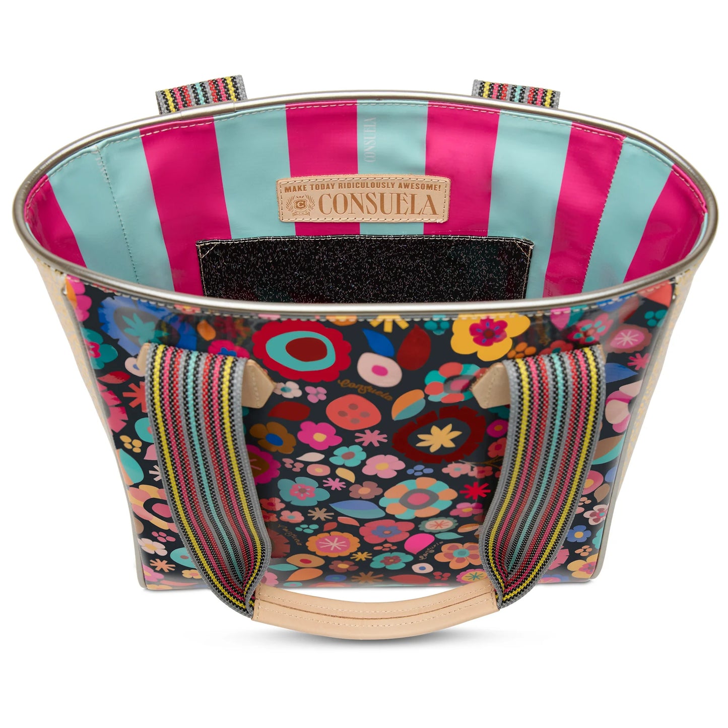Inside of the Amelie Classic Tote showing the interior zippered pocket and spacious floral-lined compartment.