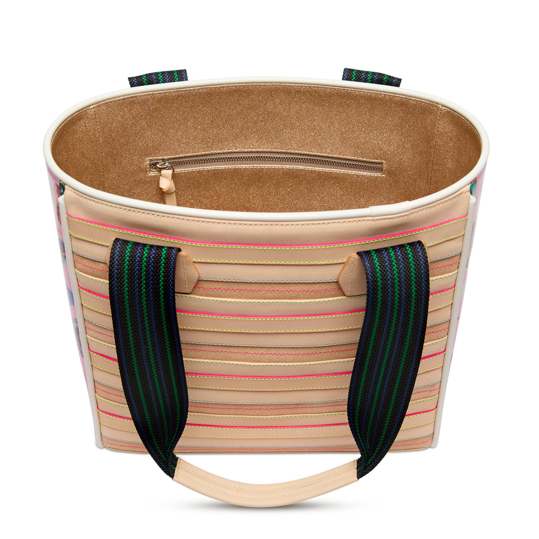 Interior view of the Consuela Caroline Classic Tote showing the roomy tan-lined compartment and a zippered pocket.