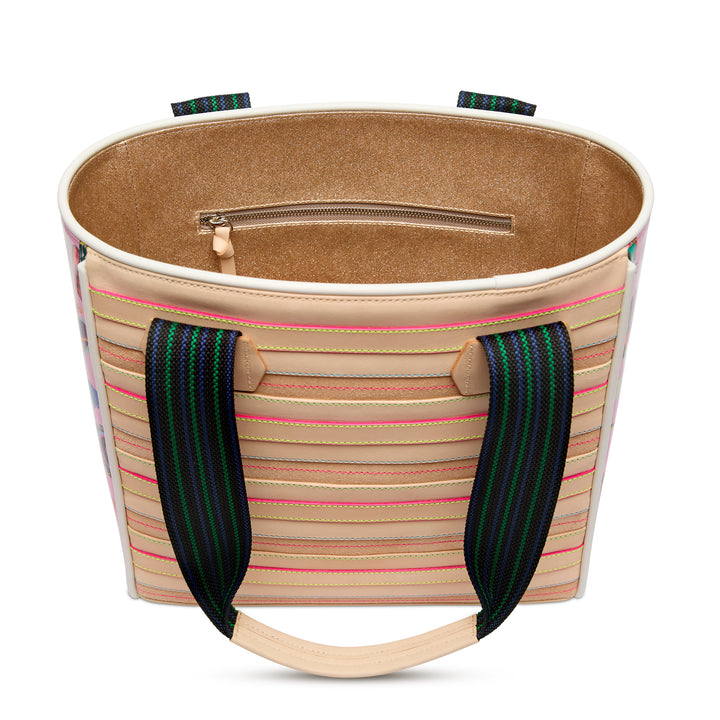 Interior view of the Consuela Caroline Classic Tote showing the roomy tan-lined compartment and a zippered pocket.