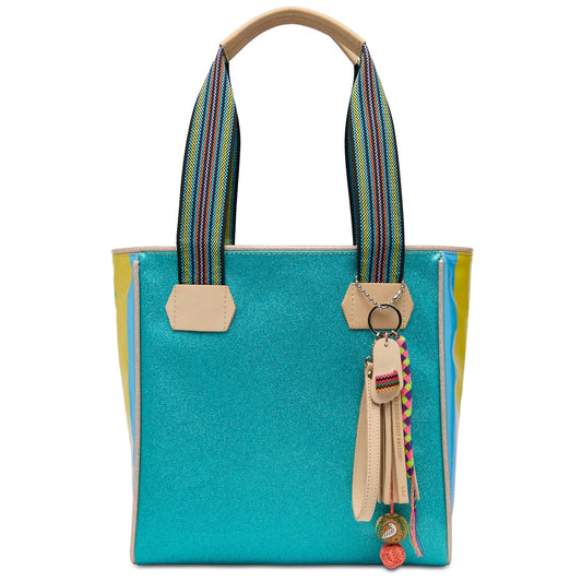 Consuela Lumi Classic Tote in turquoise glitter with natural leather trim and colorful woven handles.