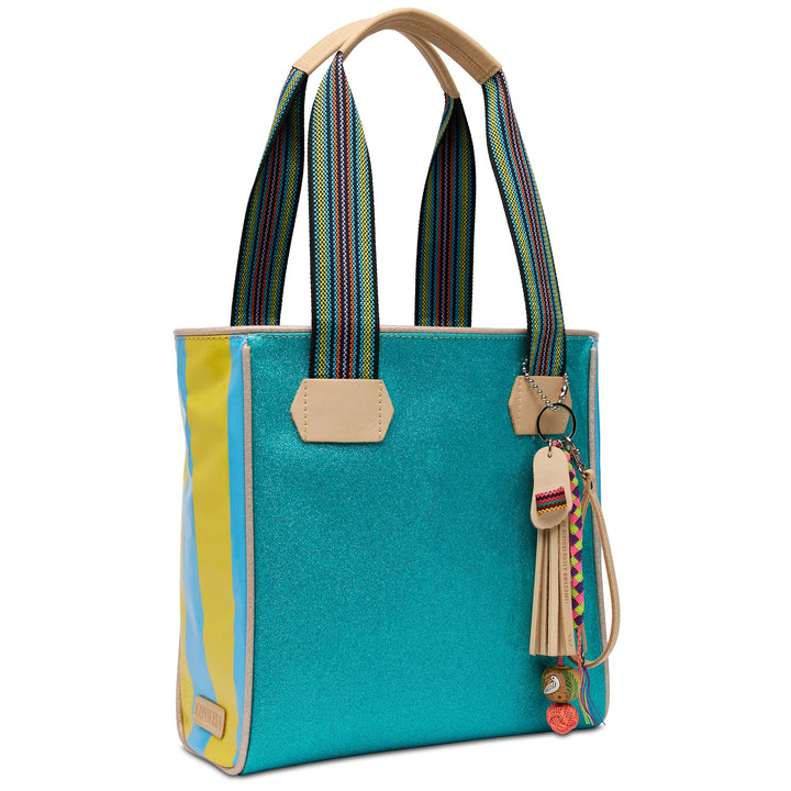 Side view of the Lumi Classic Tote showing the structured glitter panels and interior slide pocket.