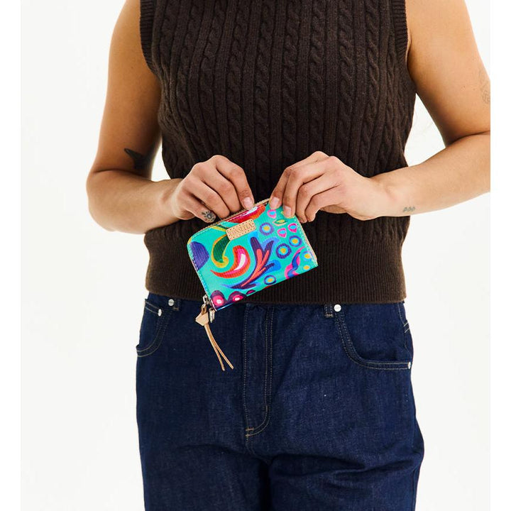 Consuela Cyndi Zippy Wallet featuring a premium black leather exterior.