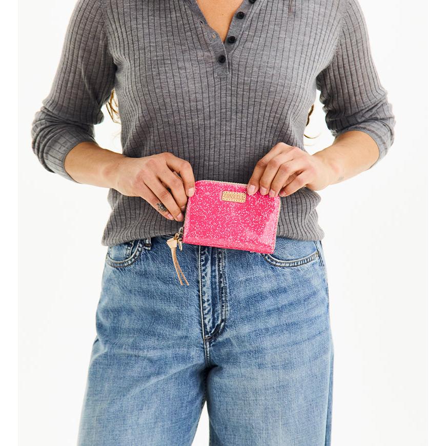 Consuela Bae Zippy Wallet featuring a multicolored glitter exterior.