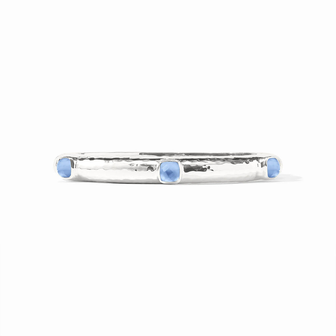 Julie Vos Catalina Stone Hinge Bangle in silver featuring Iridescent Chalcedony Blue glass end caps and a hand-hammered texture.