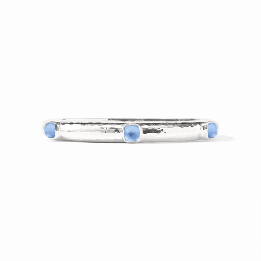 Julie Vos Catalina Stone Hinge Bangle in silver featuring Iridescent Chalcedony Blue glass end caps and a hand-hammered texture.