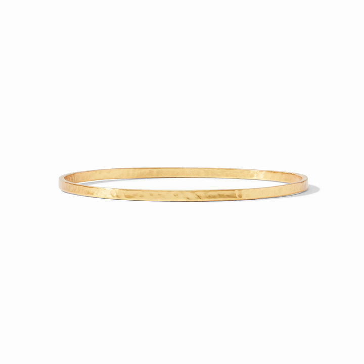 Julie Vos Crescent Bangle in 24K gold plate featuring a slender hammered design.