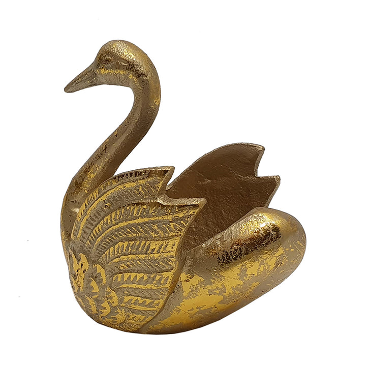 Gold swan-shaped decorative item on a white background