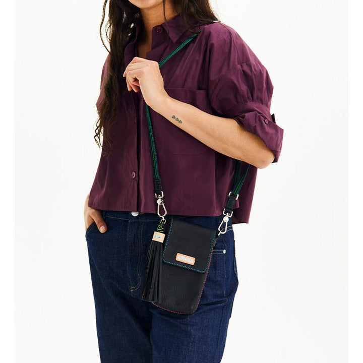 Consuela Cyndi Dash Crossbody bag featuring a colorful soft leather exterior and woven strap.