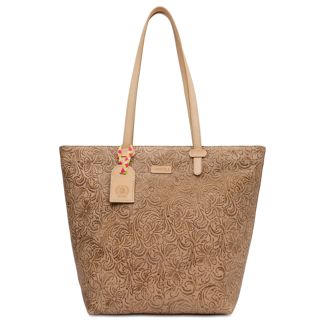 Consuela Lawton Daily Tote in floral tooled leather with natural leather handles and a signature logo tag.