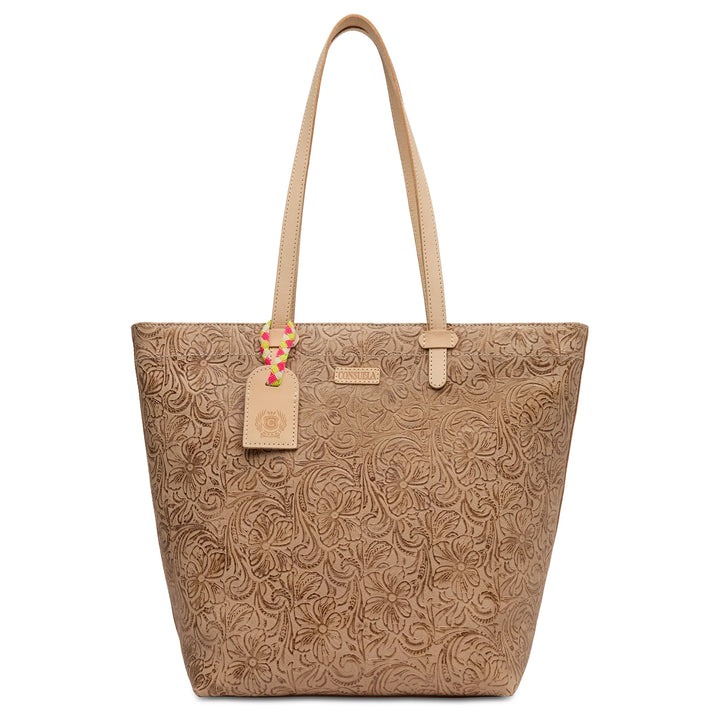 Consuela Lawton Daily Tote in floral tooled leather with natural leather handles and a signature logo tag.