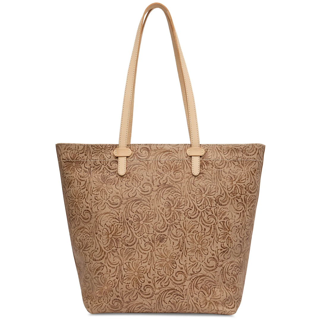 Back view of the Lawton Daily Tote highlighting the consistent floral tooled leather pattern.