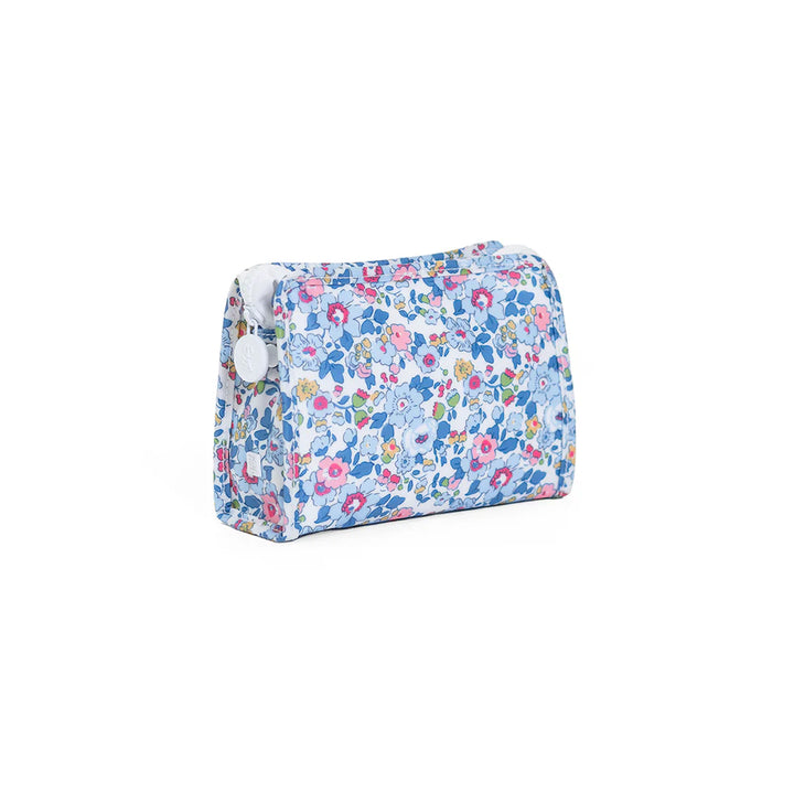 Small TRVL Design Roadie pouch in blue and white Bridgehampton Floral print with white chunky zipper and snap closure.