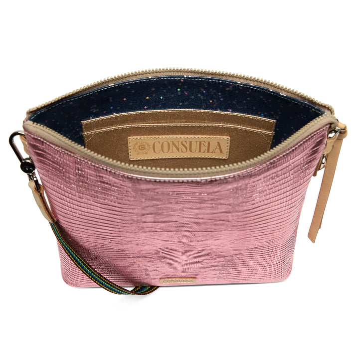 Pink textured clutch bag with visible brand logo on a white background